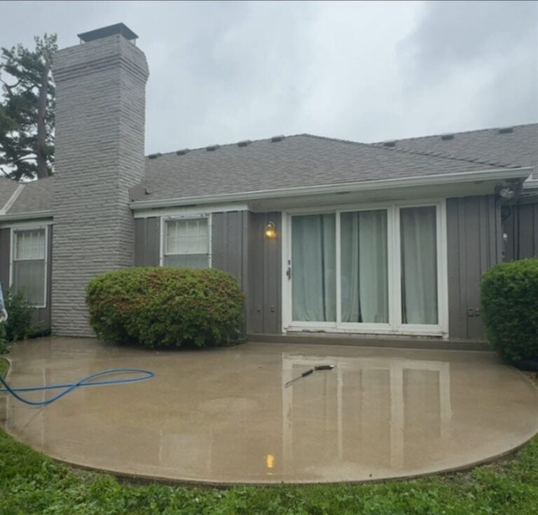 Bright, even concrete patio after pressure washing in Overland Park, KS