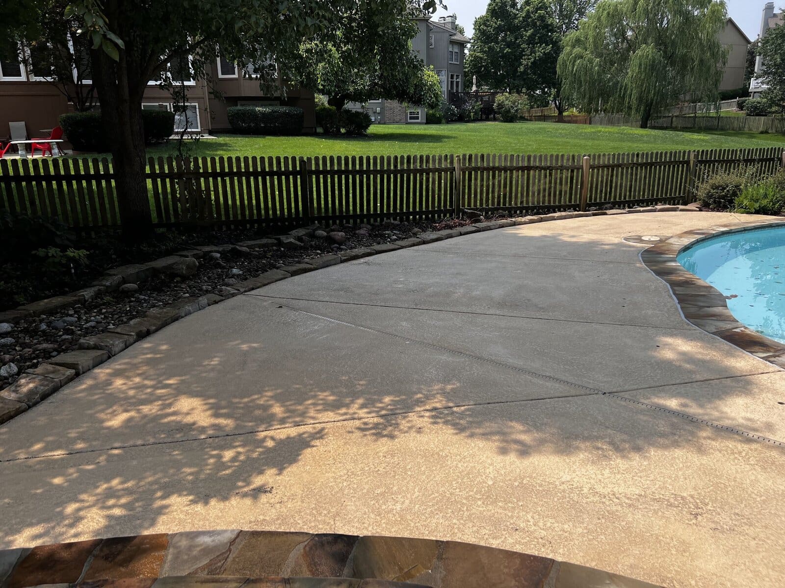 Pool deck after pressure washing — Kansas City metro