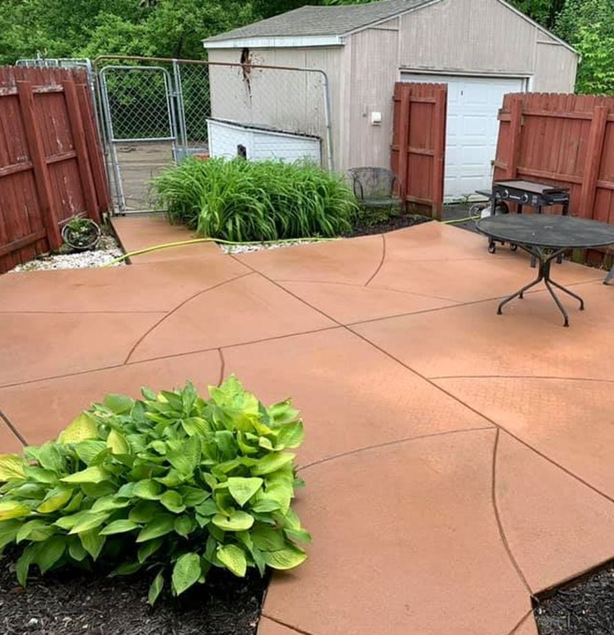 Restored concrete patio after cleaning in Parkville, MO