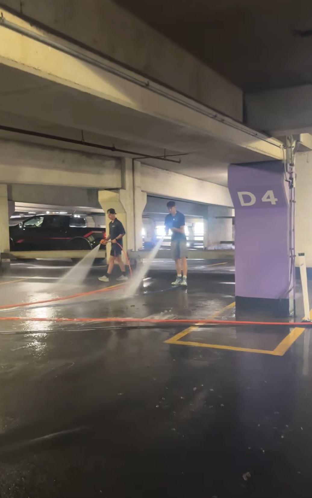 Crown Center parking garage spray washing sign — KC Splash phased section cleaning Kansas City