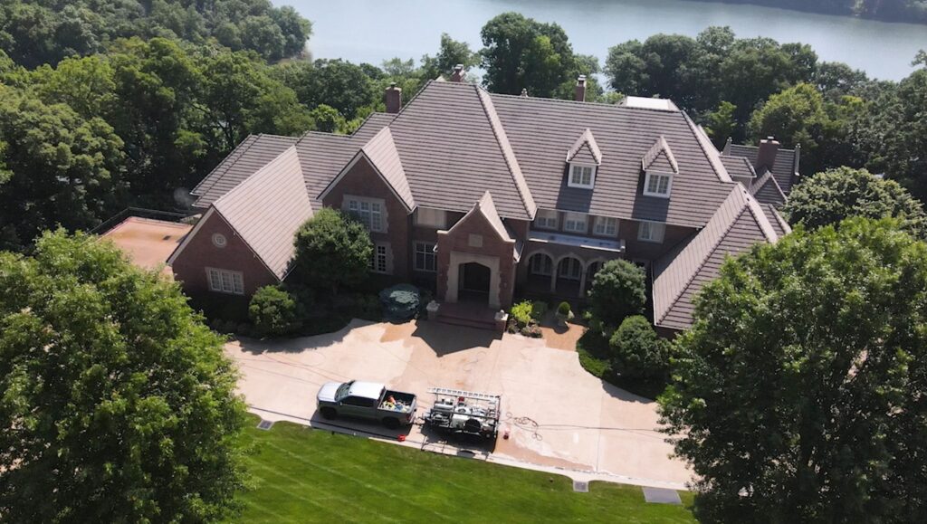 Luxury home exterior soft washing on a large estate in Leawood KS