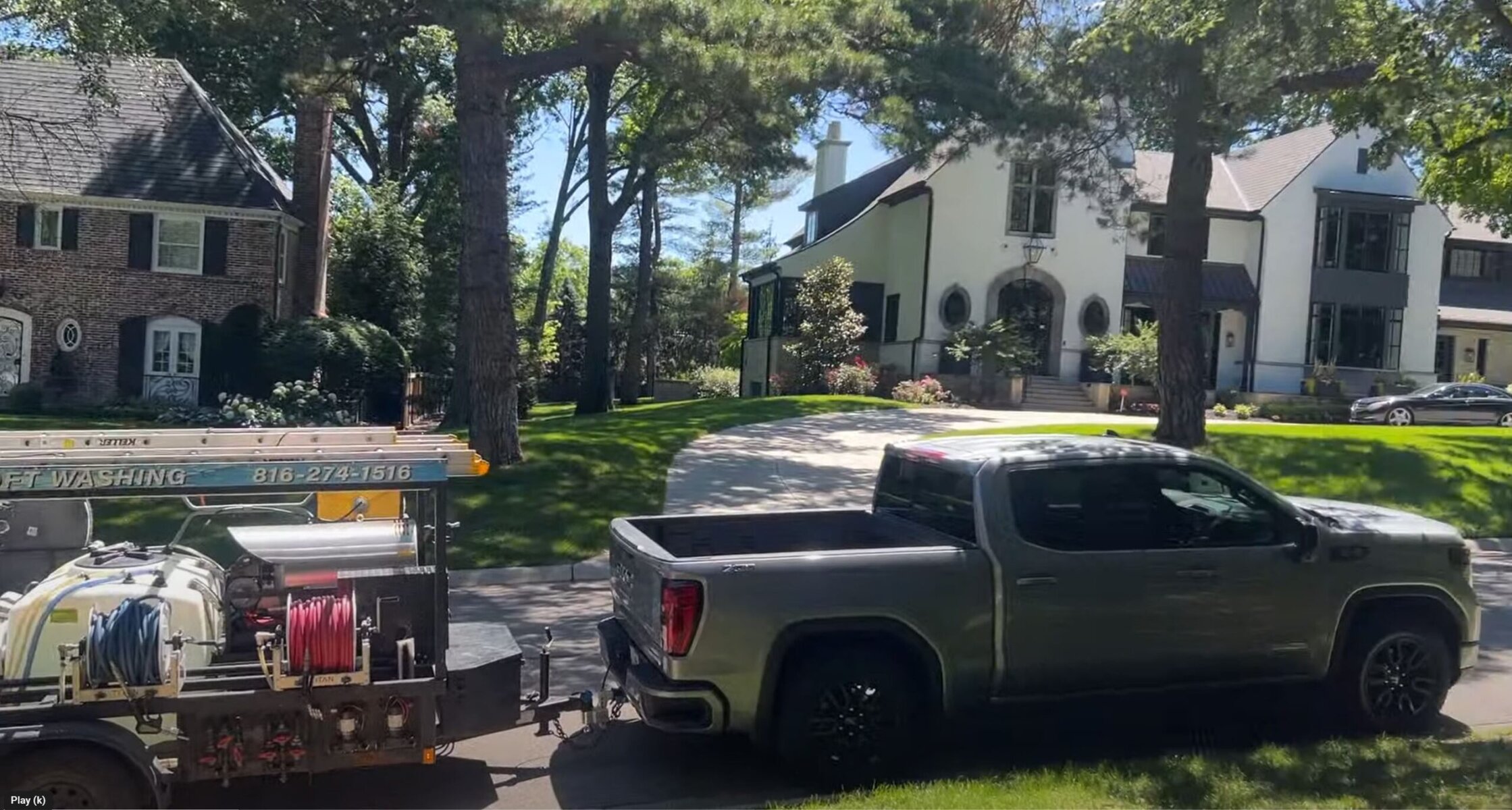KC Splash trailer in front of upscale homes in Leawood, KS