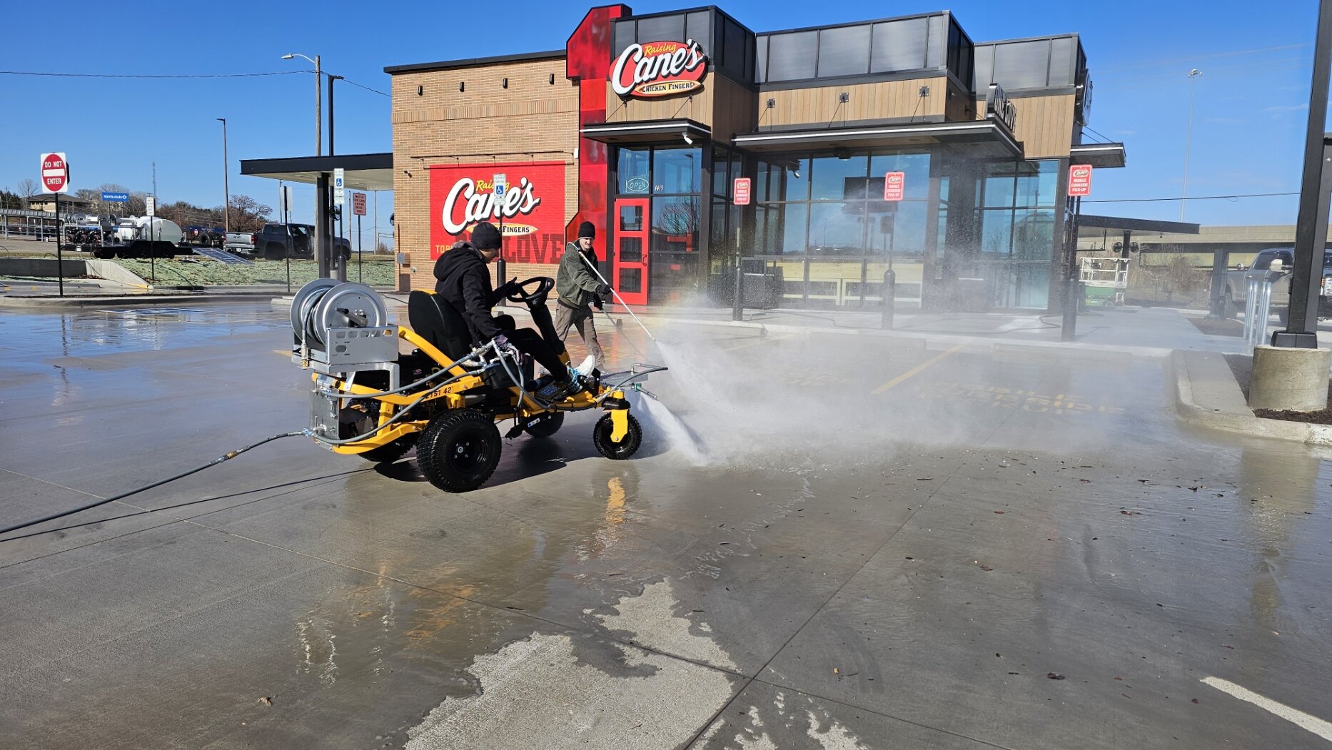 The Beast KC Splash custom ride-on surface cleaner staged for a commercial job