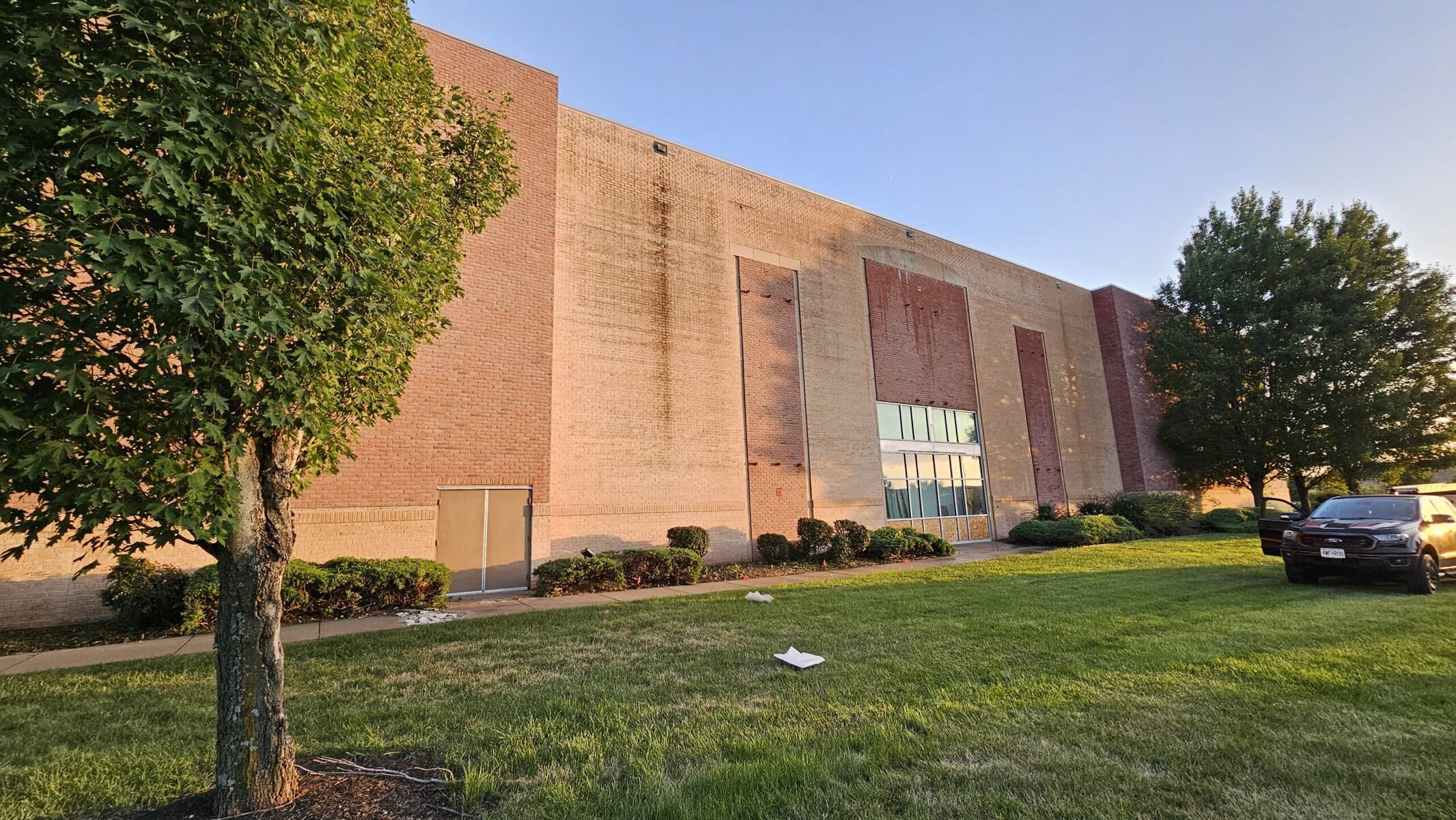 Dick's Sporting Goods building full wall width after second soft wash pass