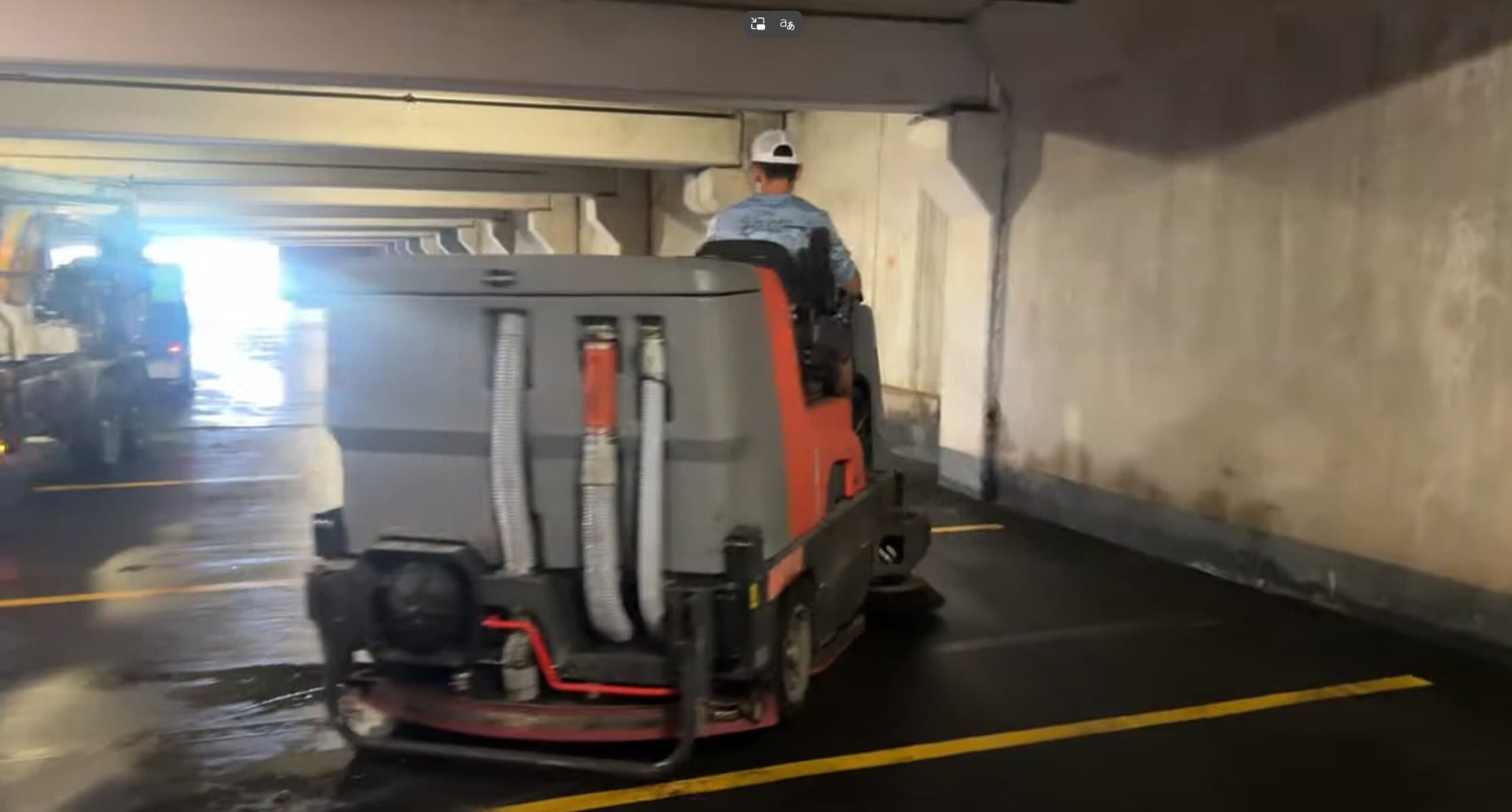 KC Splash ride-on floor scrubber cleaning Crown Center parking garage Kansas City