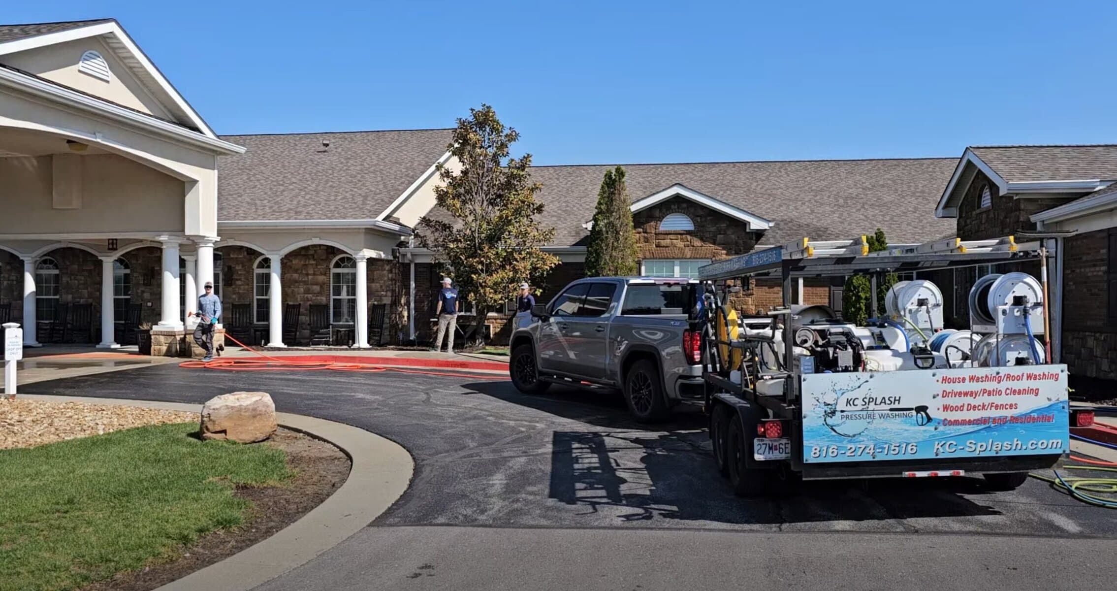Aerial drone view of KC Splash crew cleaning walkways at Addington Place Shoal Creek Kansas City