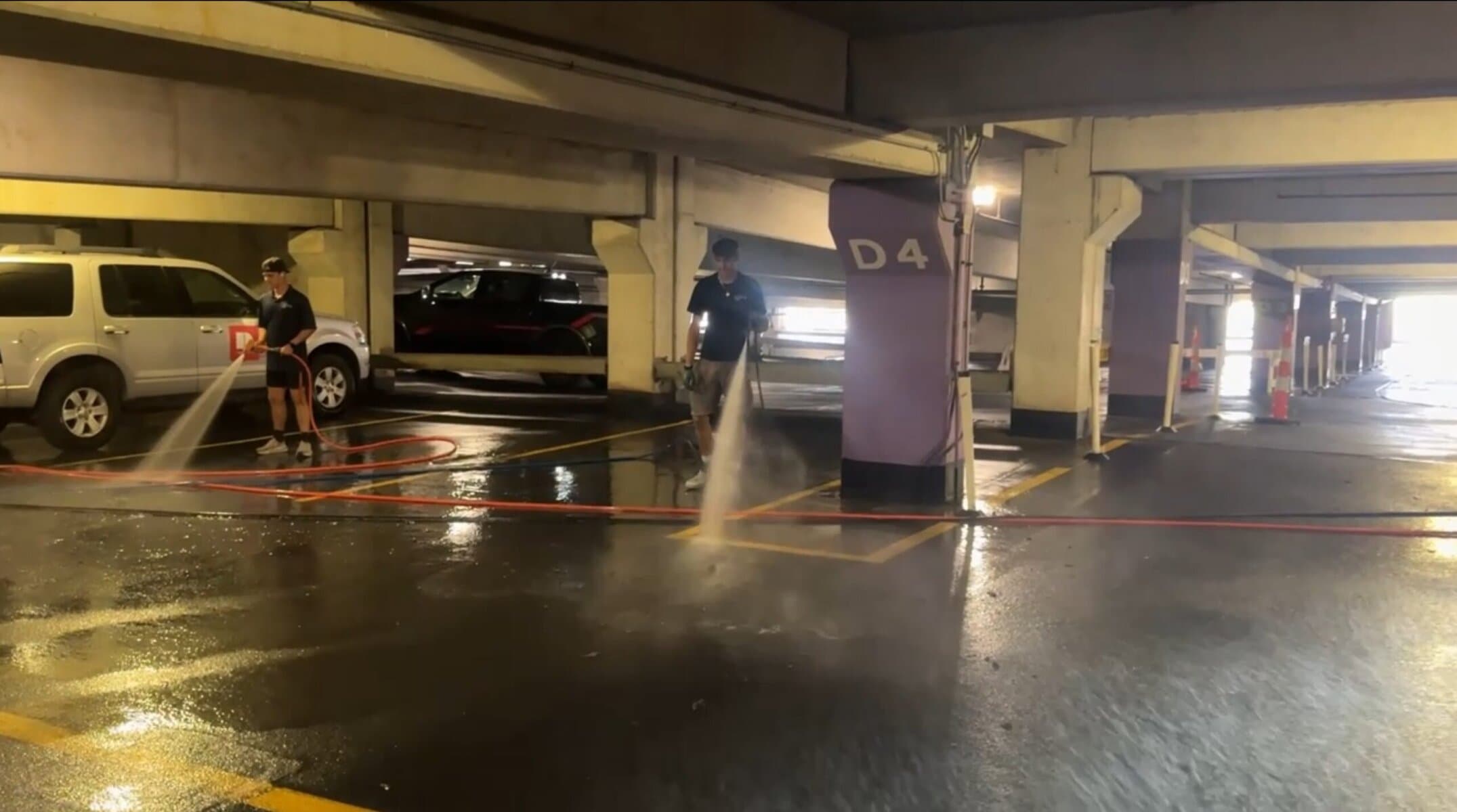 KC Splash two-man crew pressure washing Crown Center parking garage Kansas City