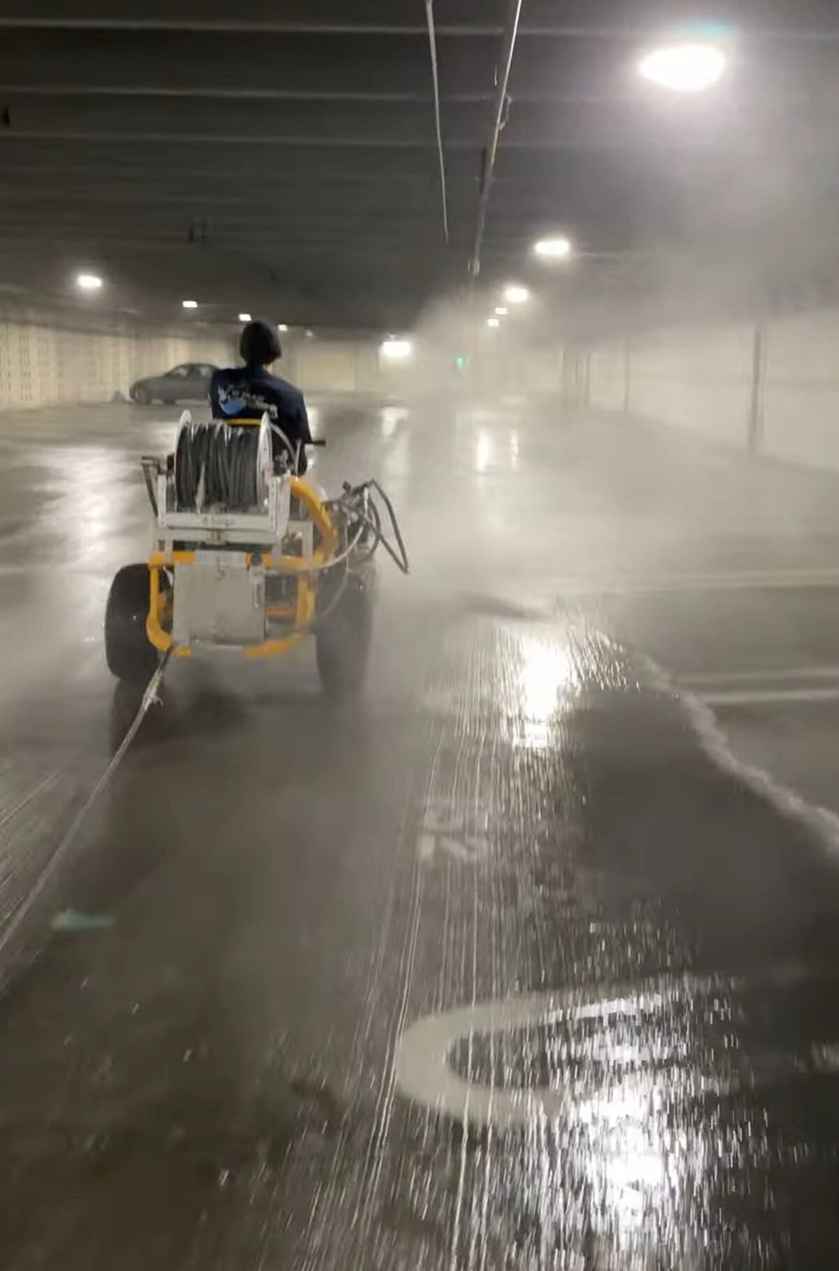 The Beast riding through internal corridors inside the library garage structure