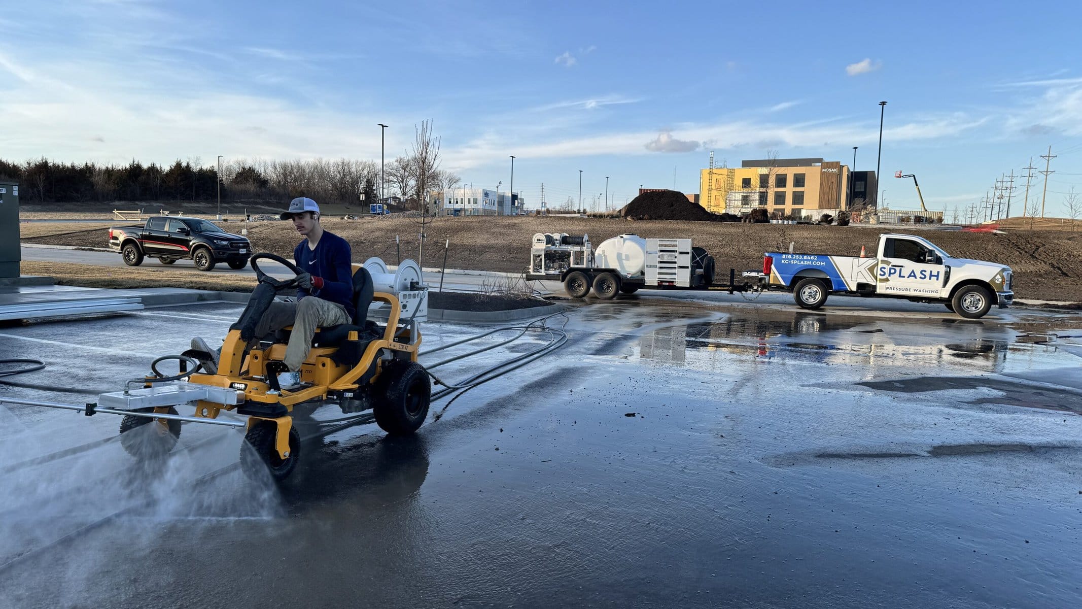 KC Splash crew member with The Beast surface cleaner