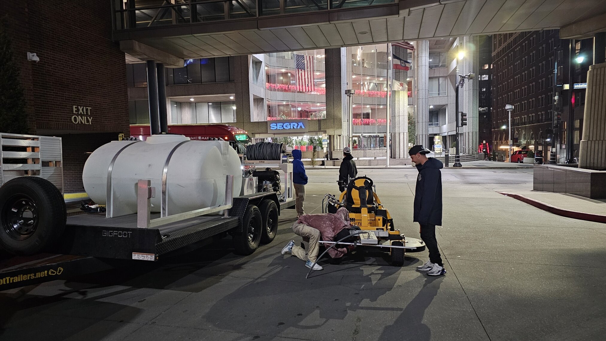 KC Splash Bigfoot trailer and Cub Cadet ride-on surface cleaner being staged for parking garage cleaning at Marriott Downtown Kansas City