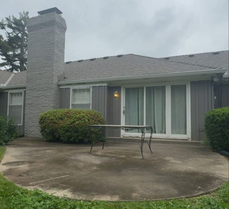 Dirty concrete patio before cleaning in Overland Park, KS