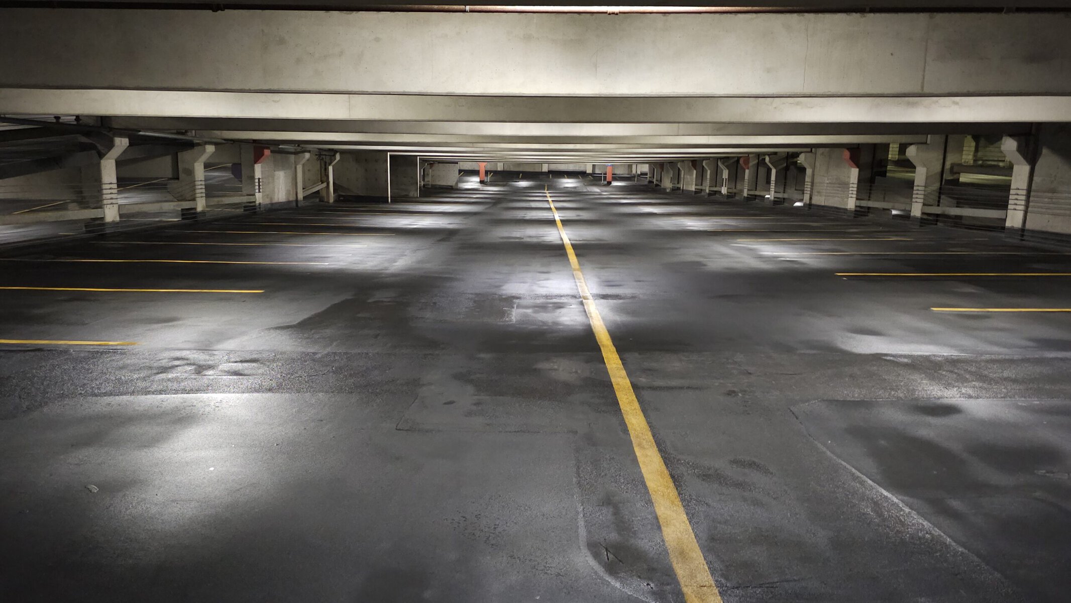 Clean concrete and fresh yellow traction lines at Crown Center after KC Splash cleaning