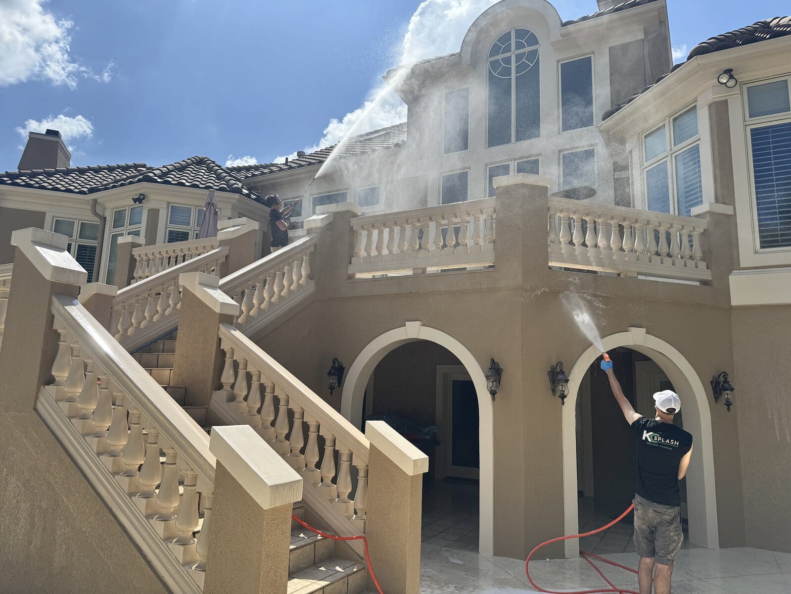 Luxury home exterior soft wash in The National Parkville MO — KC Splash crew and pool