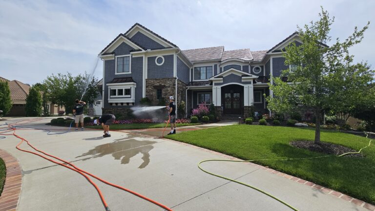 KC Splash crew soft washing a luxury shingle-style estate in Kansas City's Northland