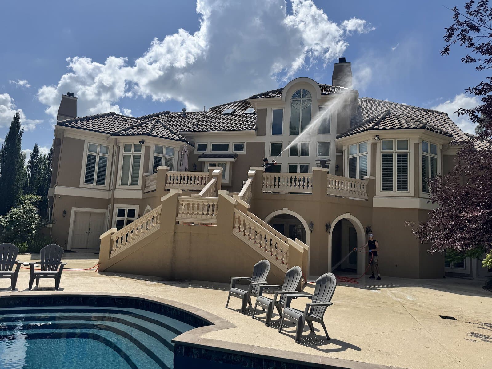 KC Splash soft washing a 10,000 sq ft luxury stucco estate in The National, Parkville MO