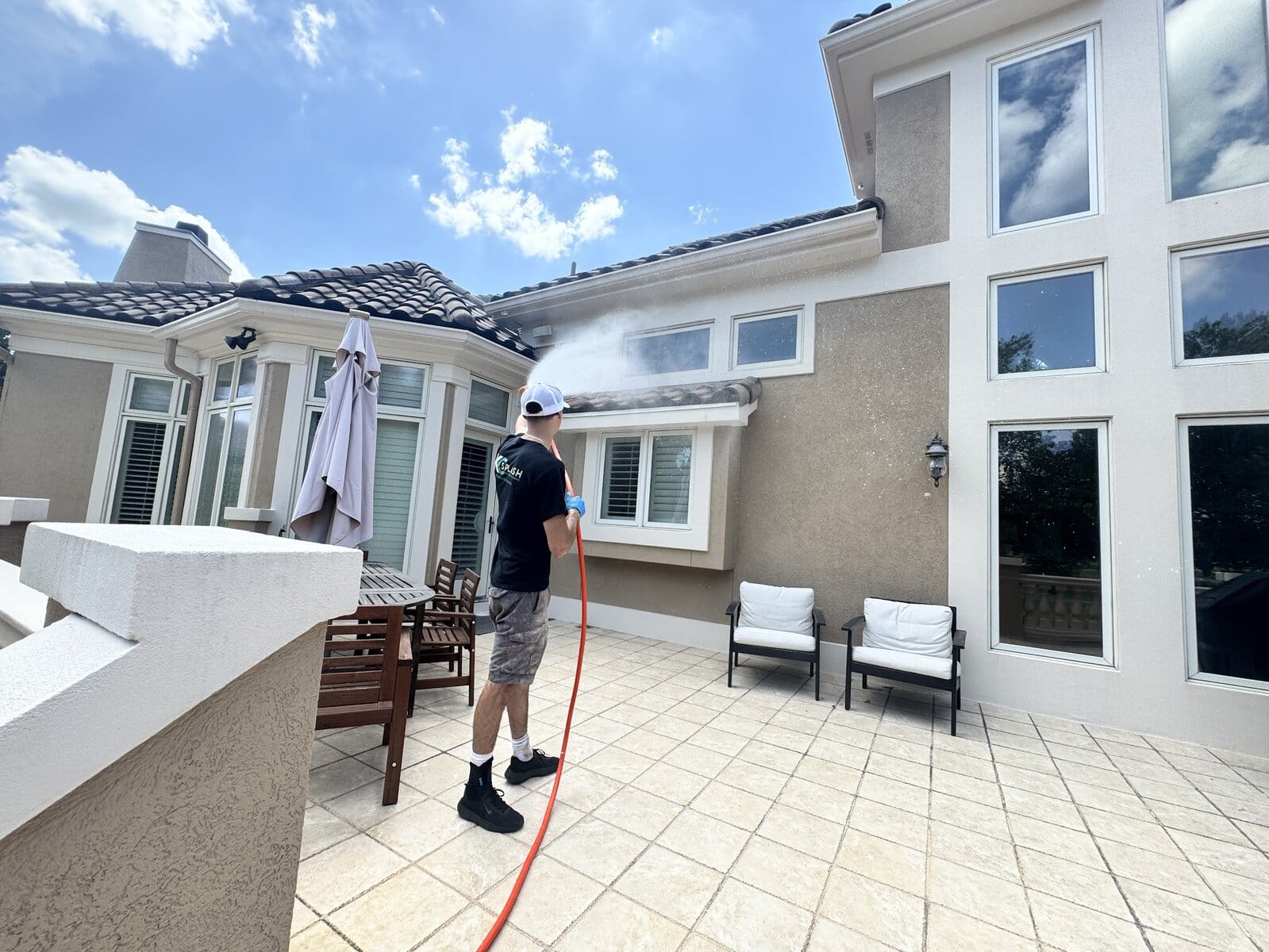 Three-story exterior window cleaning on Parkville luxury home KC Splash