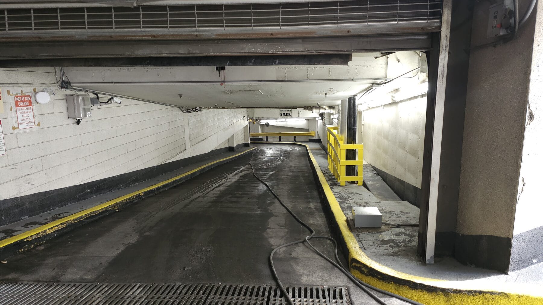 Ramp down to the lower level of the Lightwell parking garage